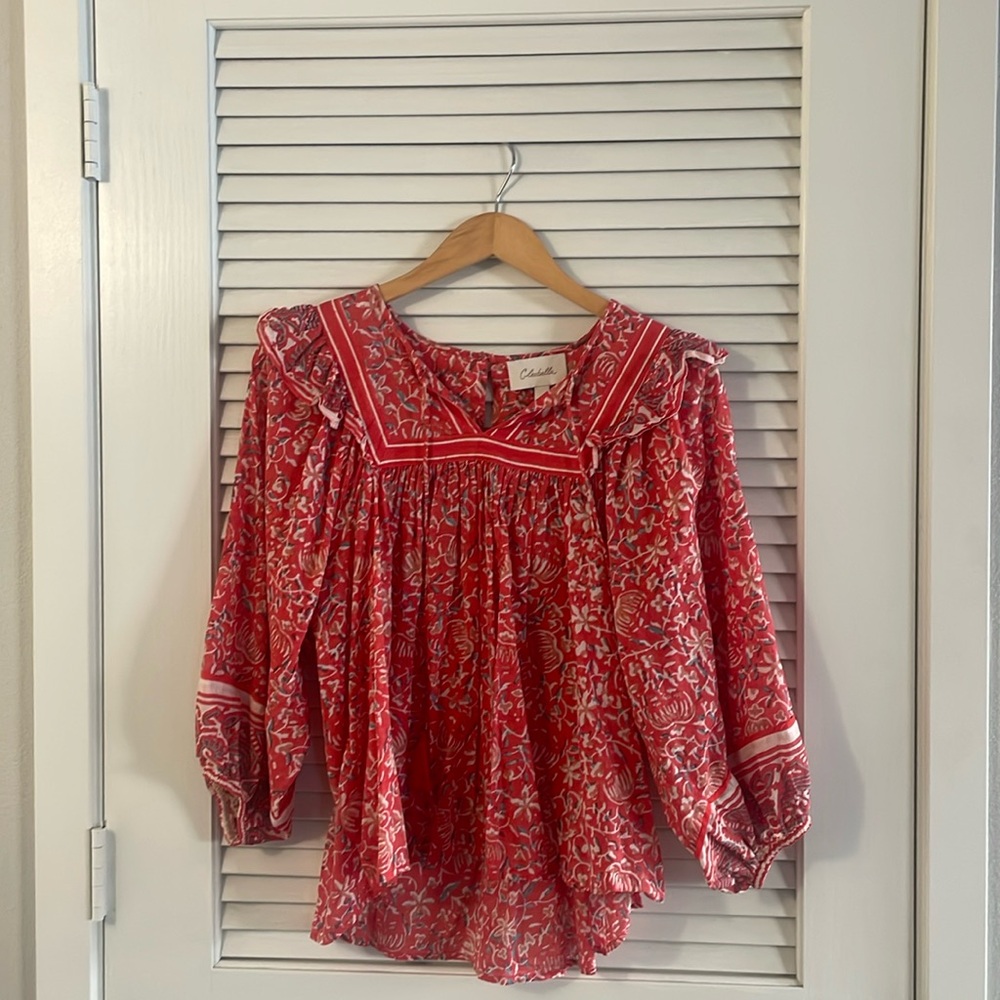 Organic cotton poplin blouse. 
Hand stamped . Mini ruffle at neckline.